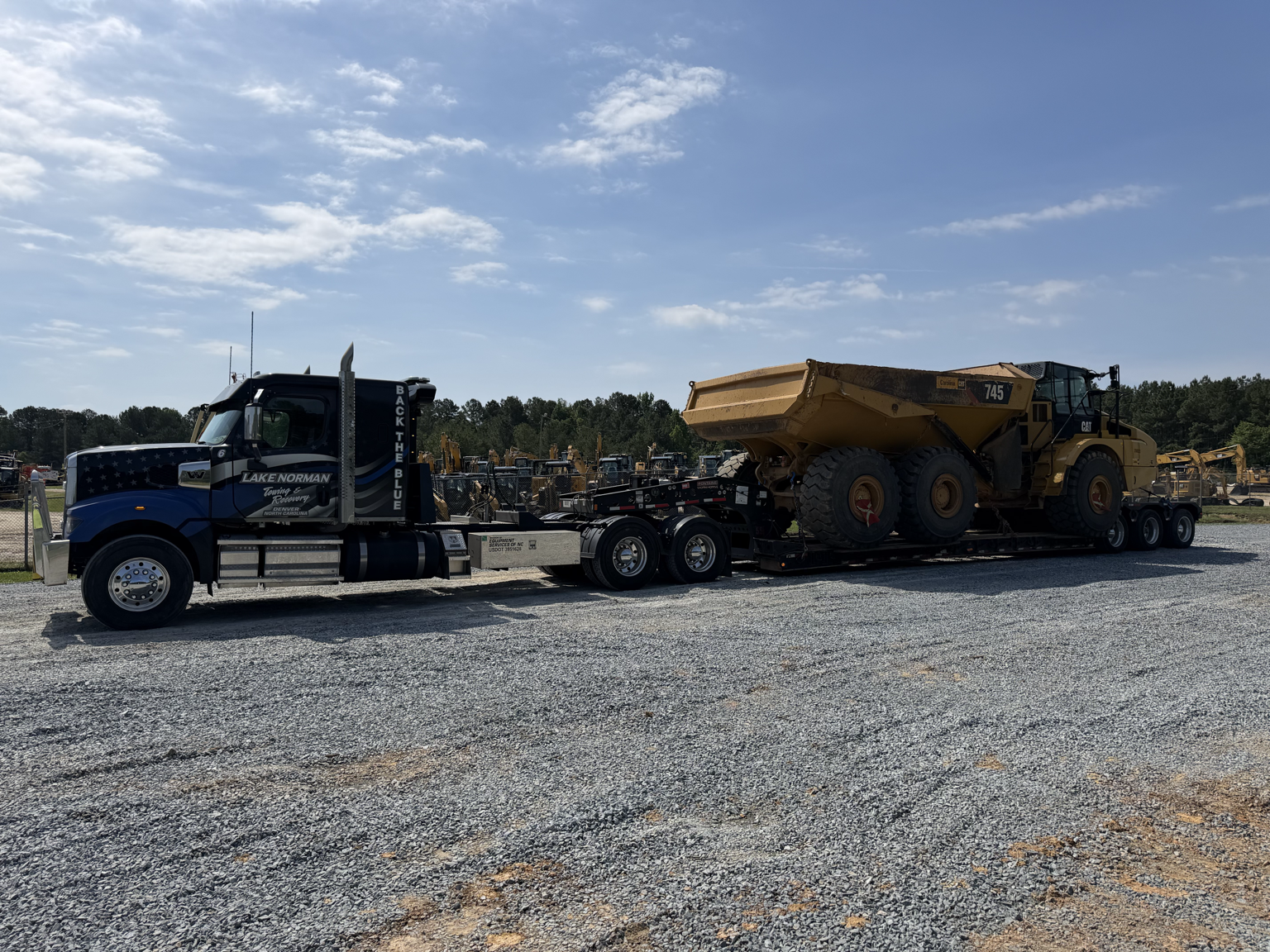 Heavy equipment transportation project by Equipment Services of NC